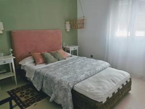 Posteľ alebo postele v izbe v ubytovaní ABA Tropical & ABA Suite