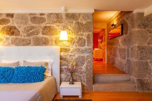 Postel nebo postele na pokoji v ubytování Quinta do Olival