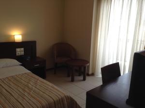 Postel nebo postele na pokoji v ubytování Hotel Electra