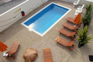 A view of the pool at Family friendly apartments with a swimming pool Okrug Gornji, Ciovo - 5218 or nearby