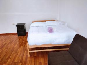 Llit o llits en una habitació de ENEDE HOSTEL