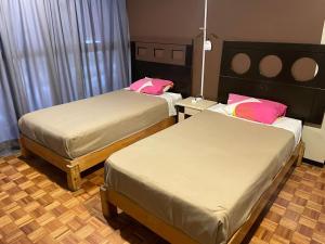 Postel nebo postele na pokoji v ubytování B&B México Roma Norte
