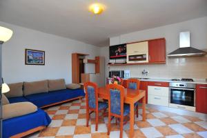 Kuchyň nebo kuchyňský kout v ubytování Apartments Valentina-B