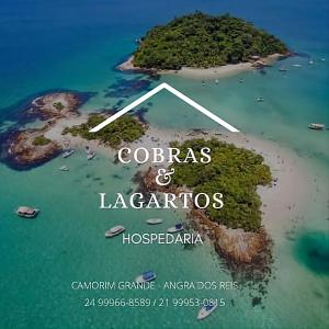 a poster of a small island in the ocean at Hospedaria Cobras E Lagartos in Angra dos Reis