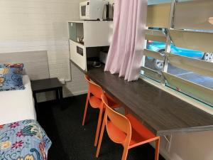 Kuchyň nebo kuchyňský kout v ubytování Paradise Motel