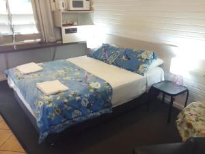 Postel nebo postele na pokoji v ubytování Paradise Motel