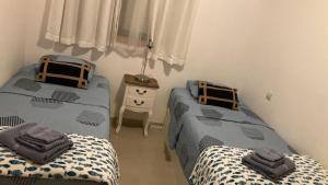 Posteľ alebo postele v izbe v ubytovaní Villa Matilde Modern 2 Bedroom Apartment Close to Beach