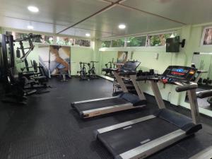 a gym with several tread machines and a simulator at Gran Lençóis Flat Barreirinhas Apt 509 in Barreirinhas +78 photos