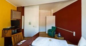 Katil atau katil-katil dalam bilik di Hotel Monpti