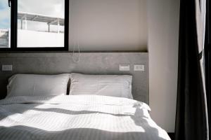Krevet ili kreveti u jedinici u okviru objekta Sweet Summer Homestay