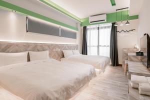 Postel nebo postele na pokoji v ubytování Sweet Summer Homestay