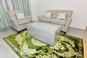 Χώρος καθιστικού στο Summit Hotel Suites - القمة للأجنحة الفندقيه