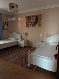 Postel nebo postele na pokoji v ubytování Dreamland upper villa