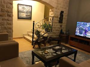 TV a/nebo společenská místnost v ubytování Dreamland upper villa