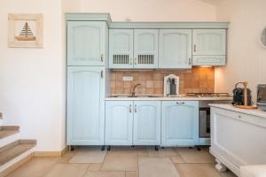 A kitchen or kitchenette at Casa Vacanza Il Bouganville