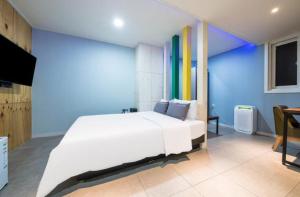 Krevet ili kreveti u jedinici u objektu Java Hotel
