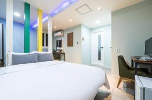 Krevet ili kreveti u jedinici u objektu Java Hotel