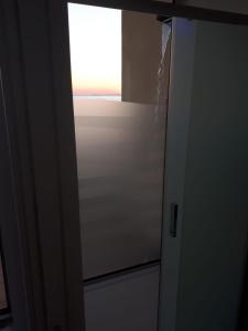 an open door with a window in a room at Hotel Residence La Darsena in Agropoli