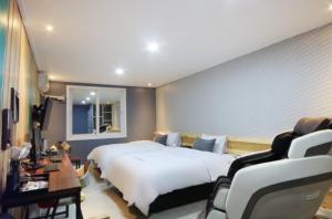Krevet ili kreveti u jedinici u objektu Java Hotel