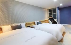 Krevet ili kreveti u jedinici u objektu Java Hotel