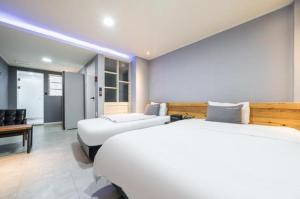 Krevet ili kreveti u jedinici u objektu Java Hotel