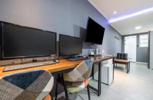 TV i/ili zabavni centar u objektu Java Hotel
