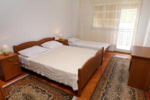 Posteľ alebo postele v izbe v ubytovaní Apartment Vinisce 4892b