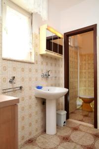 Kúpeľňa v ubytovaní Apartment Vinisce 4892b