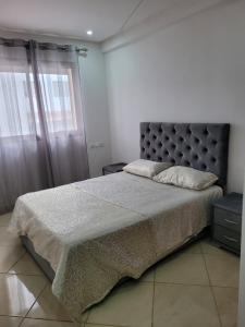 Postel nebo postele na pokoji v ubytování Résidence Machallah