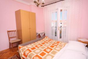 Postel nebo postele na pokoji v ubytování Apartment Palit 5061a