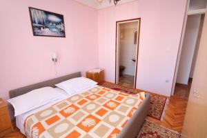 Postel nebo postele na pokoji v ubytování Apartment Palit 5061a