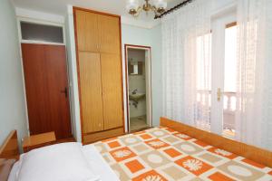 Postel nebo postele na pokoji v ubytování Apartment Palit 5061a