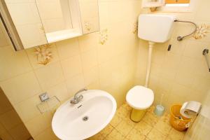 Koupelna v ubytování Apartment Palit 5061a