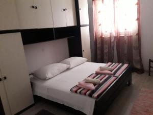 Postel nebo postele na pokoji v ubytování Apartment Barbat 5070b