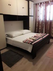 Postel nebo postele na pokoji v ubytování Apartment Barbat 5070b