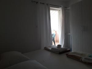 Postel nebo postele na pokoji v ubytování Apartment Barbat 5070b