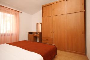 Katil atau katil-katil dalam bilik di Apartment Starigrad 6585a