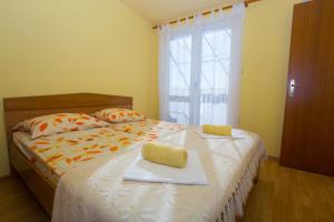 Posteľ alebo postele v izbe v ubytovaní Apartment Baska Voda 6761d