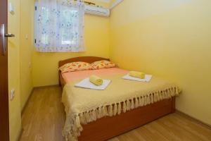 Posteľ alebo postele v izbe v ubytovaní Apartment Baska Voda 6761d