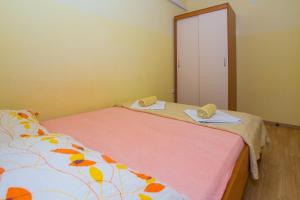 Posteľ alebo postele v izbe v ubytovaní Apartment Baska Voda 6761d