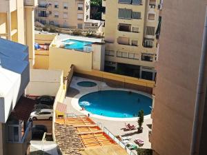 Basen w obiekcie VER7 - ESTUDIO, Wifi, Fire Stick Amazon, Terraza, Vistas al mar, Piscina lub w pobliżu