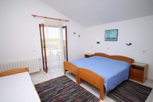 Posteľ alebo postele v izbe v ubytovaní Triple Room Gornje selo 5170e