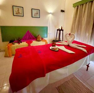 Ένα ή περισσότερα κρεβάτια σε δωμάτιο στο Silver Beach Hotel