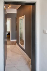 Postel nebo postele na pokoji v ubytování Apartmány pod Zámkom