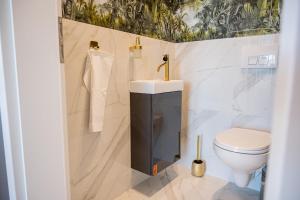 Koupelna v ubytování Apartmány pod Zámkom