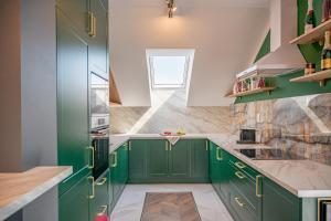 Kuchyň nebo kuchyňský kout v ubytování Apartmány pod Zámkom