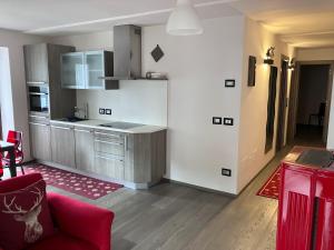 A kitchen or kitchenette at Dolomites Holiday Home