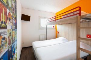 Letto o letti in una camera di Hôtel F1 Reims Tinqueux