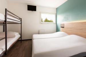 Letto o letti in una camera di Hôtel F1 Reims Tinqueux