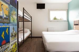 Letto o letti in una camera di Hôtel F1 Reims Tinqueux